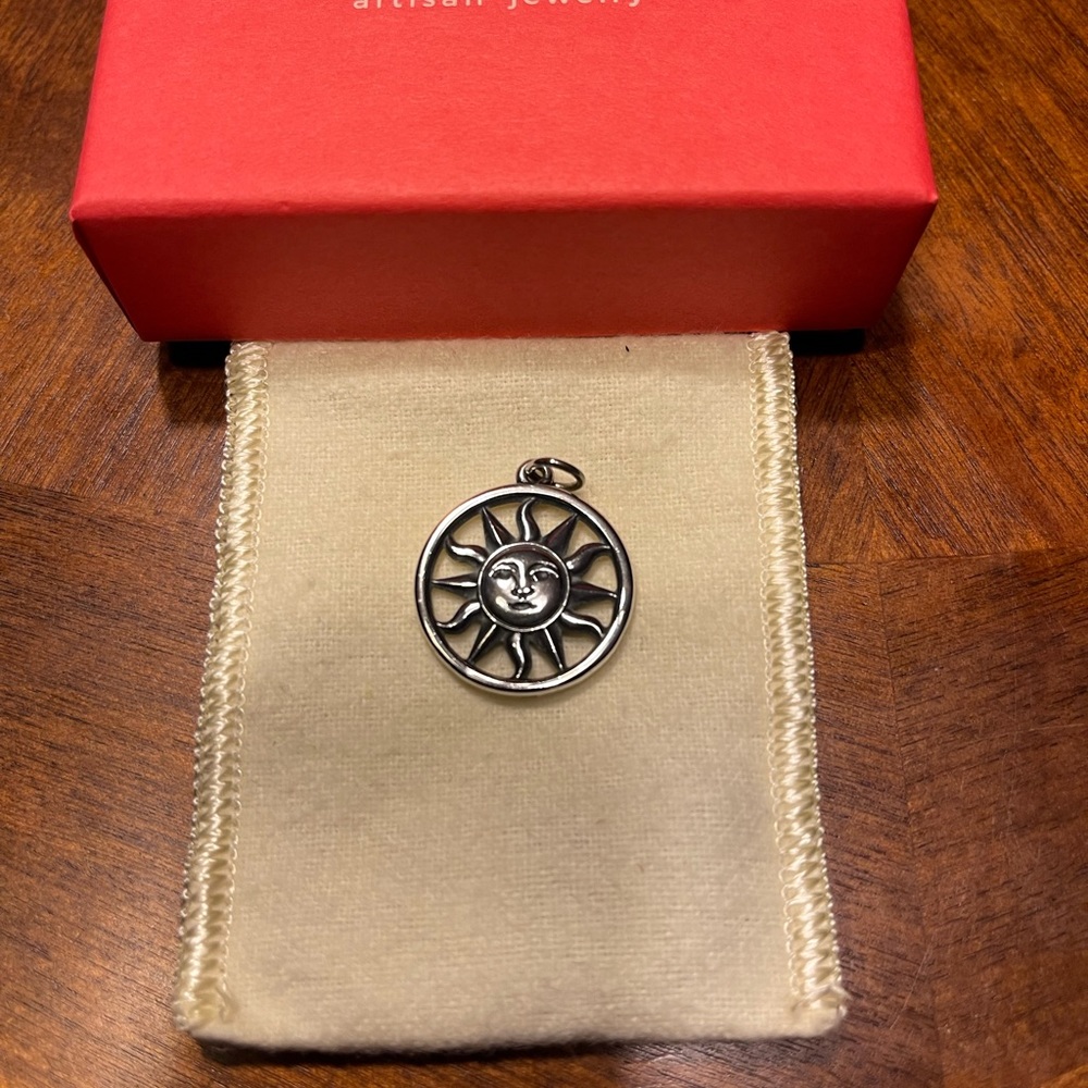 Retired James Avery Sunface charm/pendant